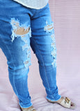 Distressed Blue Denim Jeans
